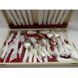 A modern canteen of silver plated flatware in fitted cream case