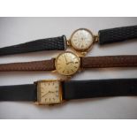 A lady's Omega wristwatch in a gold plated case, a lady's Omega wristwatch in a 9ct. gold case and