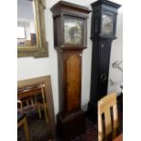 A longcase clock by W Hough of Wrexham with brass dial, pierced spandrels, seconds dial, date