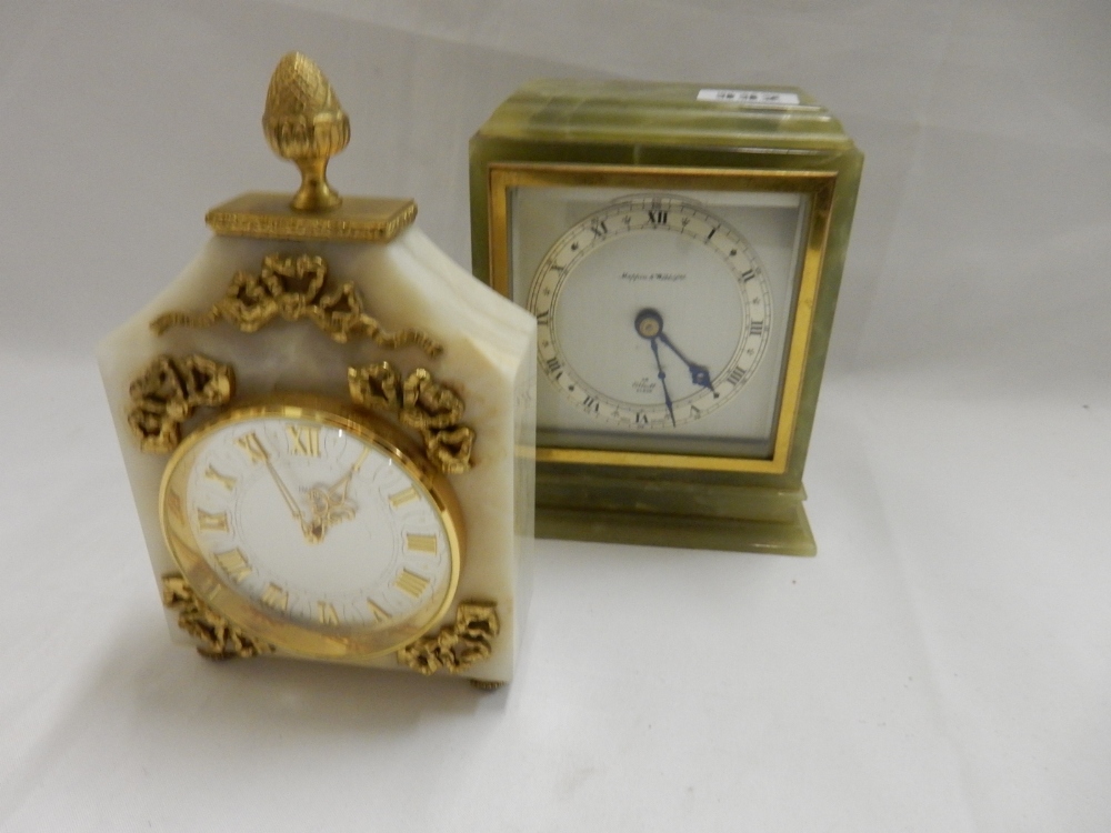 An Elliott mantel clock retailed by Mappin and Webb, in a green onyx case and one other mantel clock