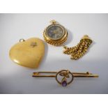 A 9ct. gold bar brooch set amethyst and seed pearls, a 15ct. gold watch fob set compass and