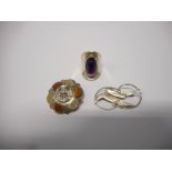 A Bent Knudsen Danish silver ring set amethyst, a Scottish silver coloured metal brooch inset