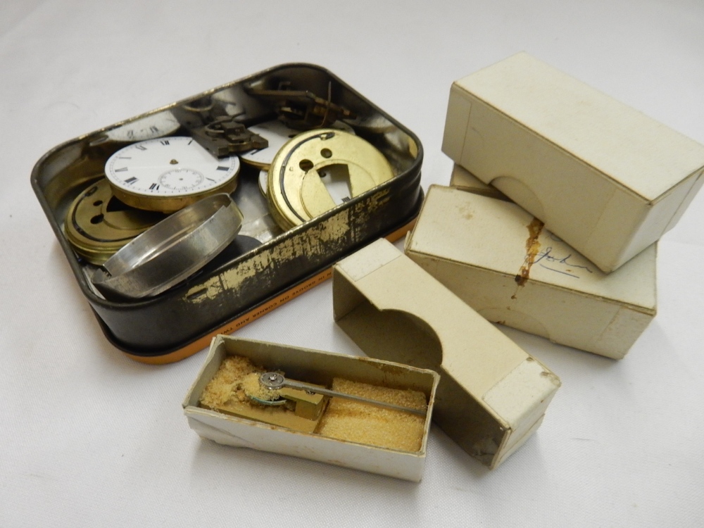 A selection of carriage clock balance wheels, box of dials etc..