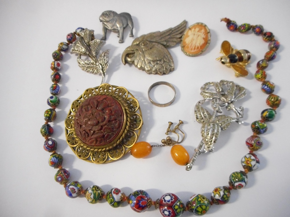 A quantity of costume jewellery including an Italian bead necklace, marcasite brooches, brooch in