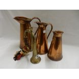 Three graduated copper ewers, a copper dish, a brass trivet, bugle, copper tray, pair of opera