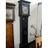 A longcase clock with brass dial bearing name Windmills London, silvered chapter ring, pierced