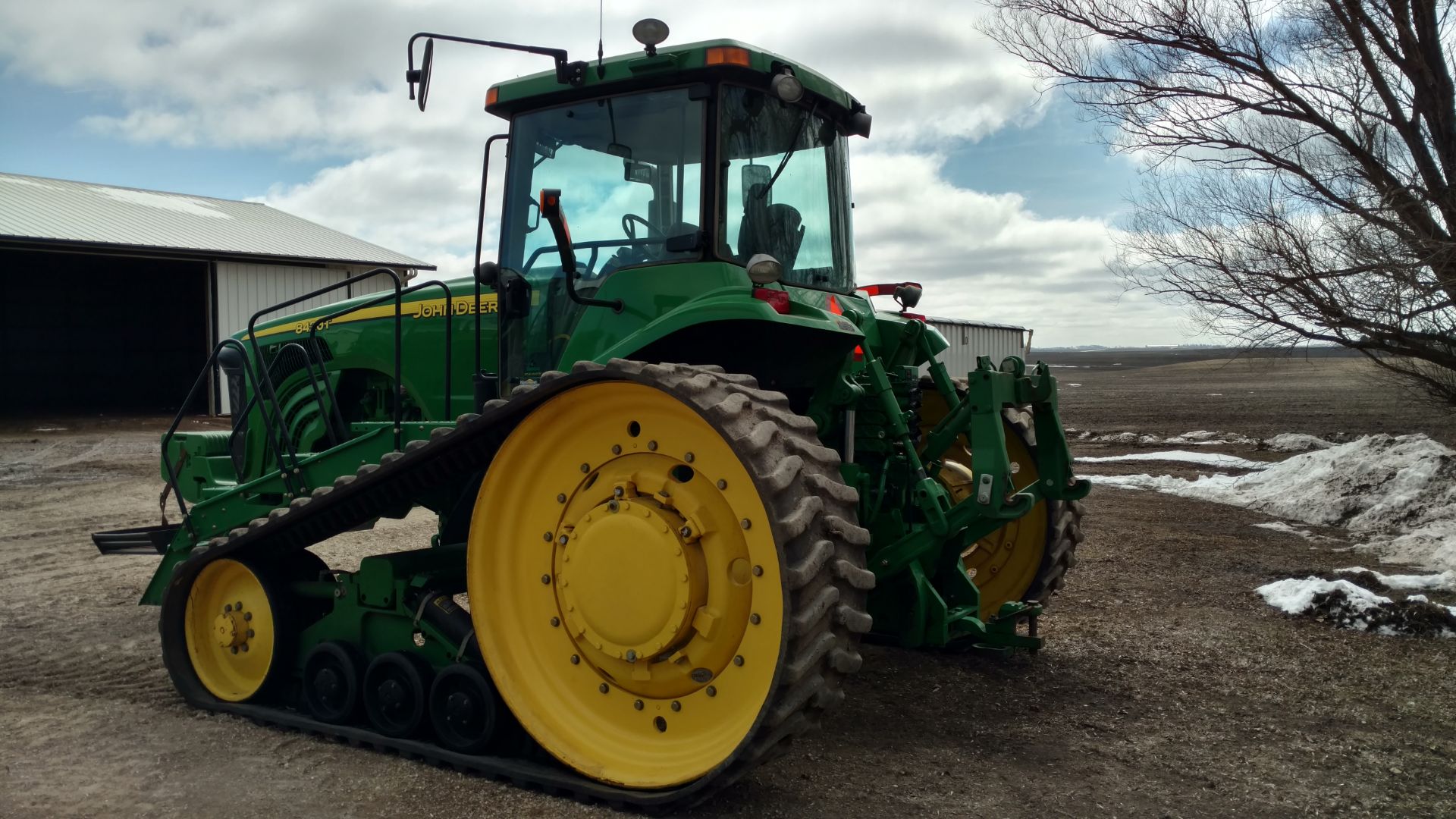 2002 JD 8420T, 24 inch tracks, quick coupler, full set of front weights, buddy seat, 4 hyd. outlets,