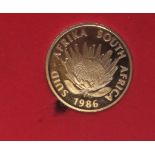 South African Mint Boxed 1986 1 oz Gold Coin.