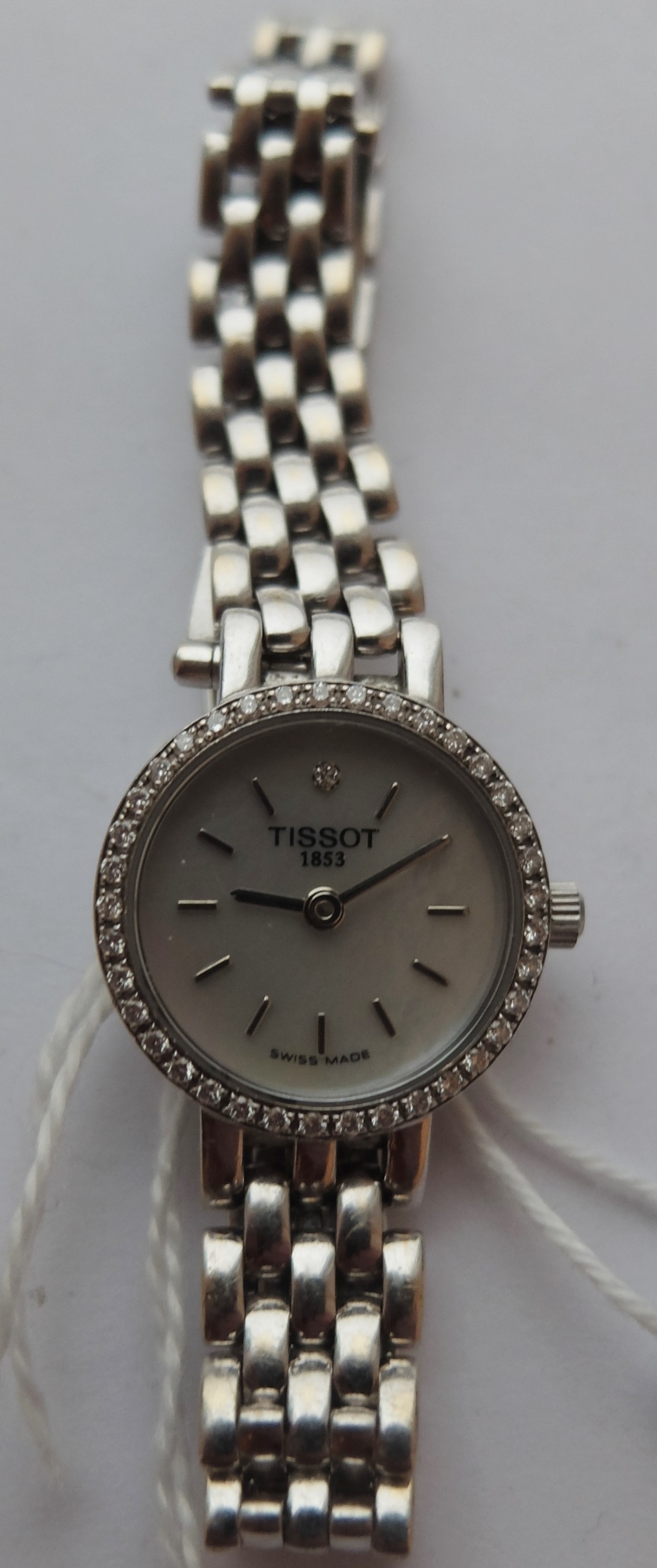 Ladies 18ct White Gold Tissot Quartz Watch with MOP Face - 12 o'clock diamond and a Diamond Bezel.