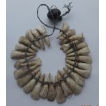 Antique Ethnic Fiji ? Islands (Fijian)? Tooth Necklace with 27 teeth - each tooth approx 50mm long.