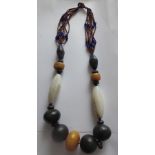 Vintage African Tribal Necklace with Beads-Wood-Butterscotch Amber? etc - approx 68cm long.