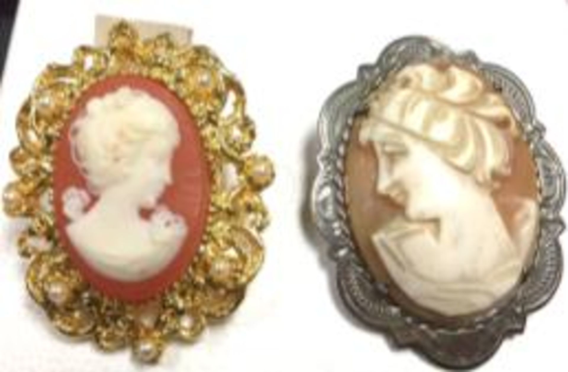 2 x cameo brooches