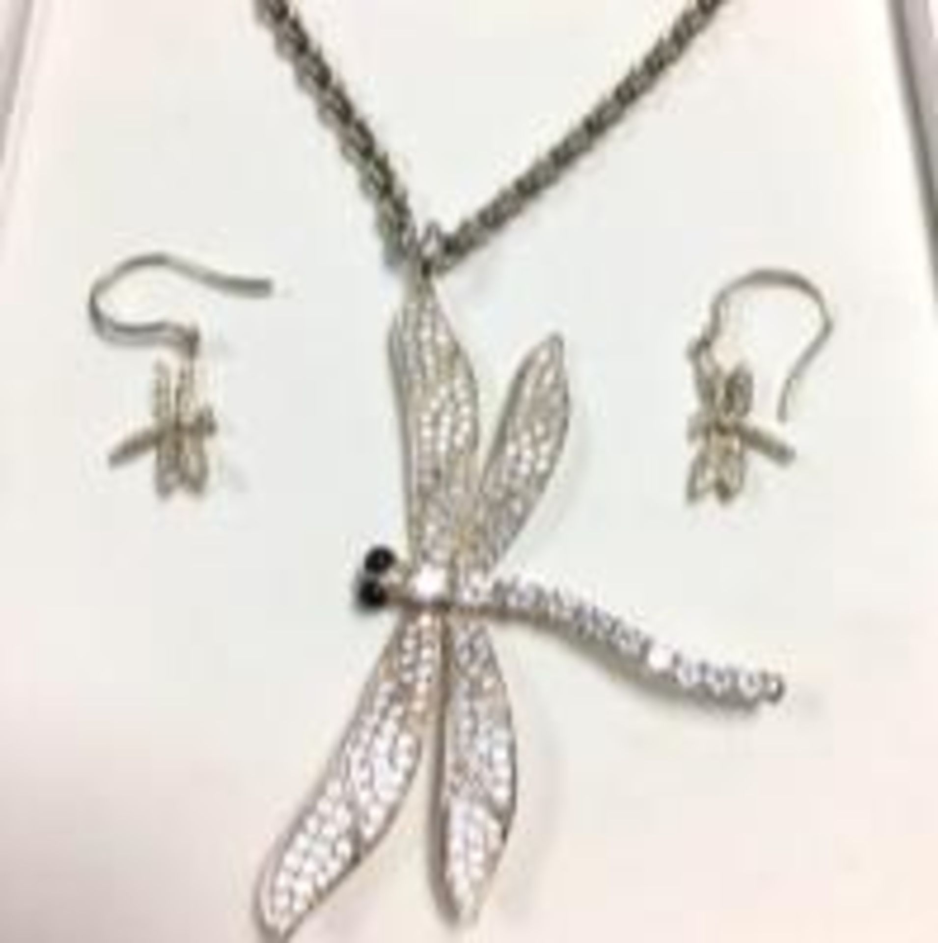 Thomas Sabo sterling silver necklace with dragonfly pendant and matching earrings