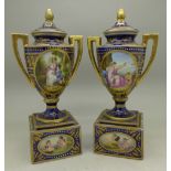 A pair of Vienna porcelain pedestal vases on square bases,