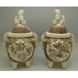 A pair of Japanese Satsuma jars and covers, a/f,