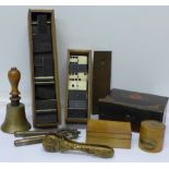 Two sets of ebony and bone dominoes, a card case, Mauchlin ware box, brass hand bell,