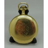 A rolled gold full hunter pocket watch, the dial marked Fairchild,