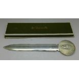 A French silver paper knife, marked Christofle, France,