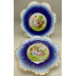 A pair of blue frilled Border Angelica Kaufmann classical scene printed plates,