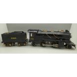 A Lionel Lines 262E model steam locomotive 2-4-2 with tender,