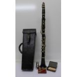An early 20th Century clarinet, marked Jerôme, Thibouville Lamy,