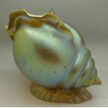 A large iridescent glass nautilus shell vase, possibly Loetz Papillon, fault to rim,