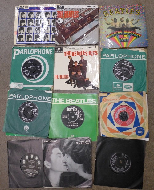 Twenty-five Beatles 45rpm records including Hard Days Night, Magical Mystery Tour, EPs, etc.