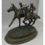 A horse racing figure group, resin,