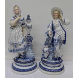 A pair of blue and white continental figures, one a/f, blue anchor mark and other impressed marks,