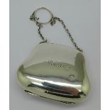 A lady's silver purse with chain,