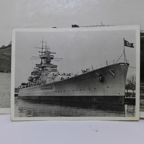 A collection of German photographs including military warships and bomb damage - Image 5 of 6