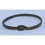 An early copper alloy serpent bangle