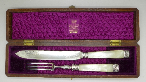 A Victorian oak cased silver plated and mother of pearl carving set, By Appointment, Elkington & Co.
