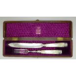A Victorian oak cased silver plated and mother of pearl carving set, By Appointment, Elkington & Co.