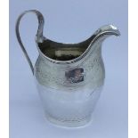 A George III cream jug, London 1800, 103g,