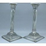 A pair of silver candlesticks, Birmingham 1911,