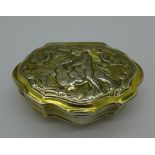 An 18th Century gilded white metal snuff box, decorated with Hercules' First Labor, The Nemean Lion,