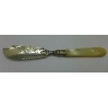A Victorian silver butter spreader with mother of pearl handle