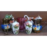 A Staffordshire cow creamer with matched lid, a flatback figure of a deer, two lustre jugs, one a/f,