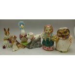 Two Beswick Beatrix Potter figures, a Royal Doulton Disney's 101 Dalmatians figure, Rolly,