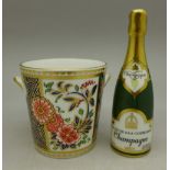 A Royal Crown Derby champagne bottle and bucket