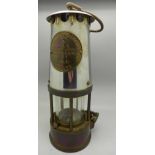 An Eccles miner's safety lamp,