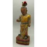 A carved wood and painted Chinese figure,