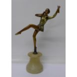 An Art Deco figure of a dancer, on base, fingers a/f,