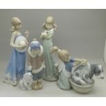 Four Lladro figures, height of tallest 20.