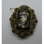 A Victorian gilt metal and enamel brooch