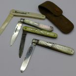 Four penknives; two with silver blades including George Unite,