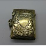 A silver vesta case,