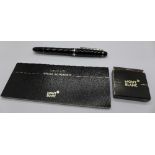 A Mont Blanc fountain pen with refills and service guide, 14ct gold nib,