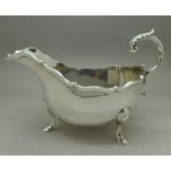 A William Greenwood & Sons silver gravy boat, Birmingham 1927, 335.